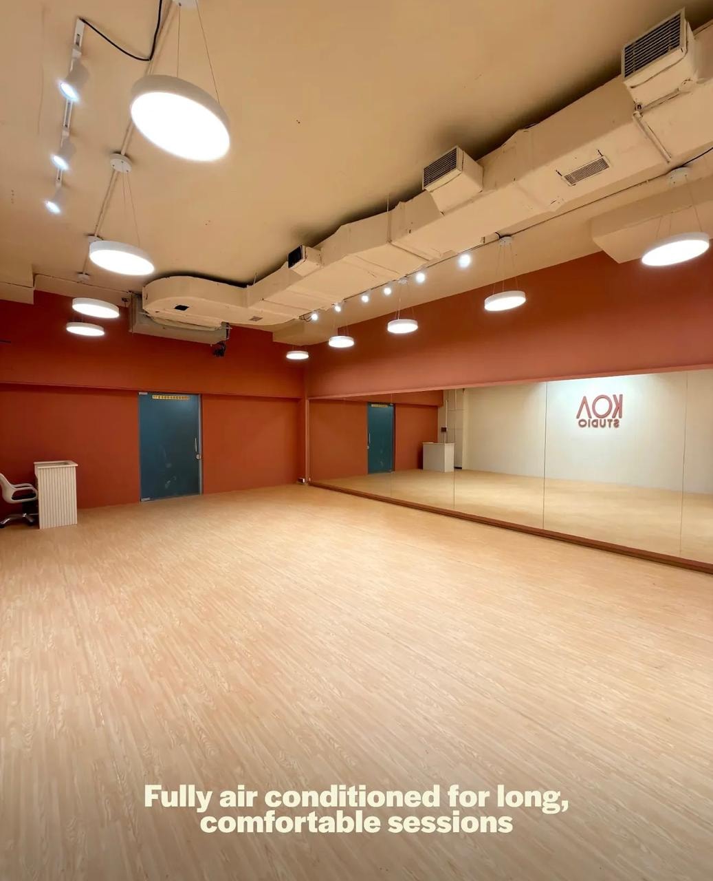 KOA Studio interior with warm wood floors